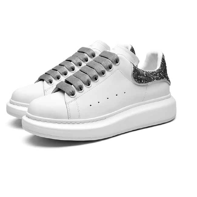 WOMEN'S Alexander McQueen Oversized Sneaker in White/jet Silver