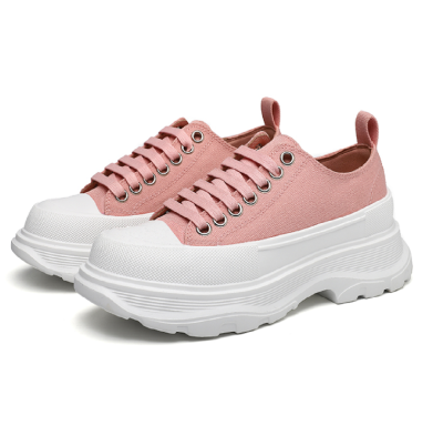 WOMEN'S Alexander McQueen Tread Slick Lace Up Sneakers in pink