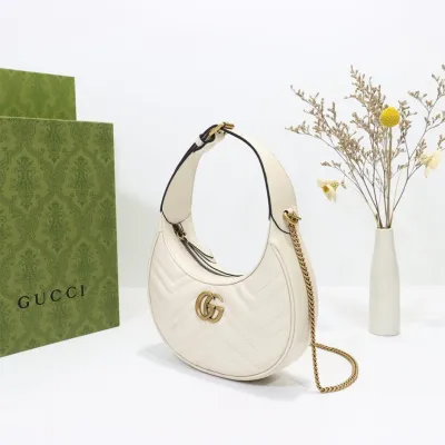 GG Marmont half-moon-shaped mini bag