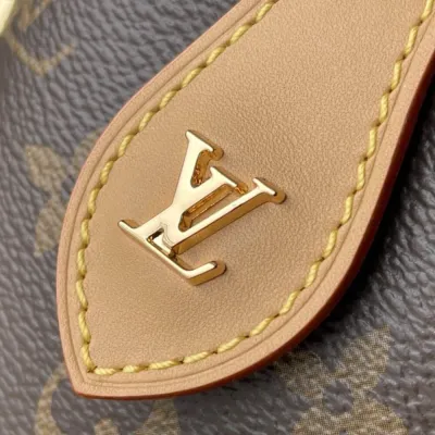 LV fold me clutch bag