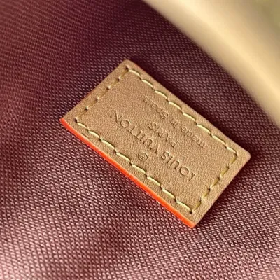 LV fold me clutch bag